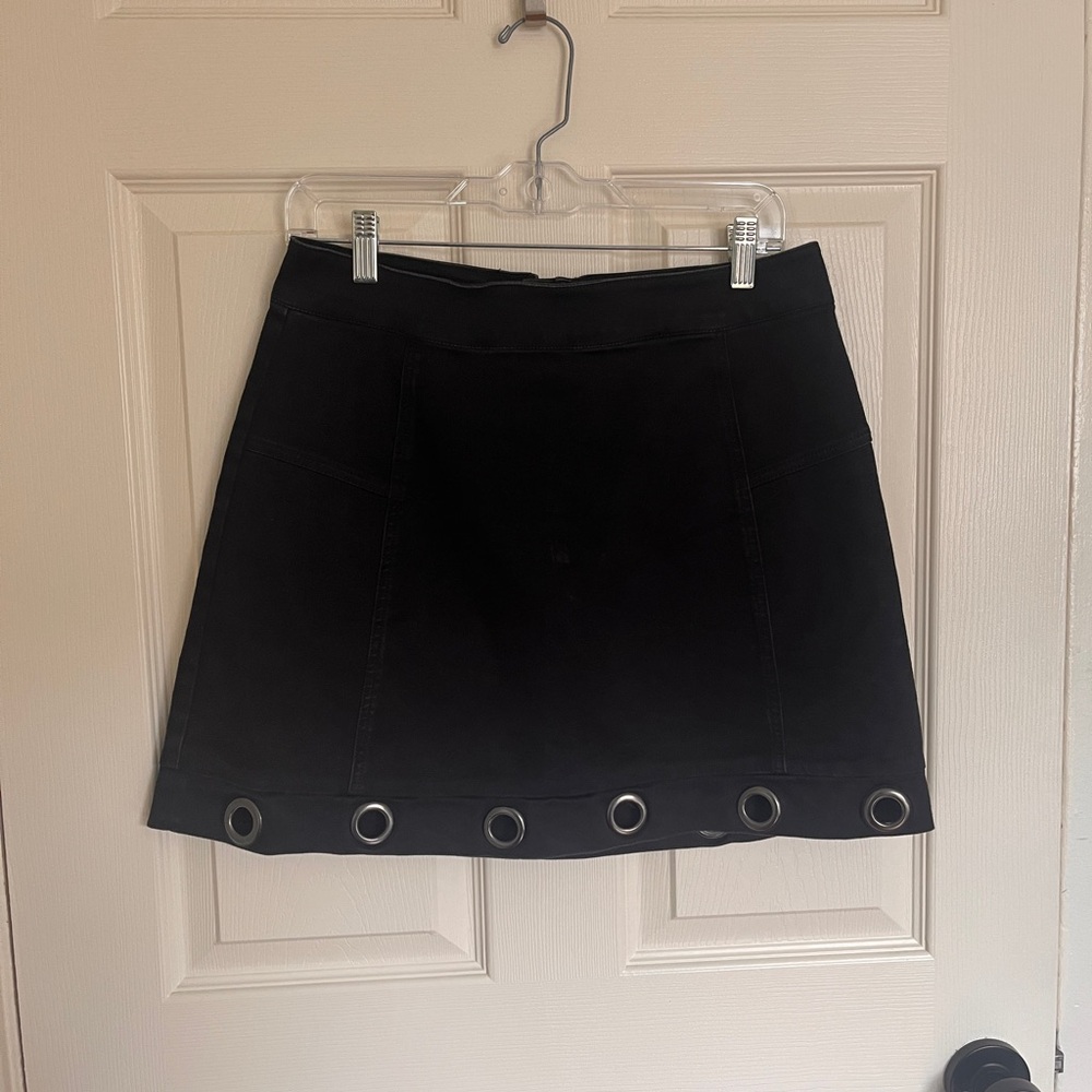 Material Girl Black Mini Skirt with Gunmetal Grommet Detail